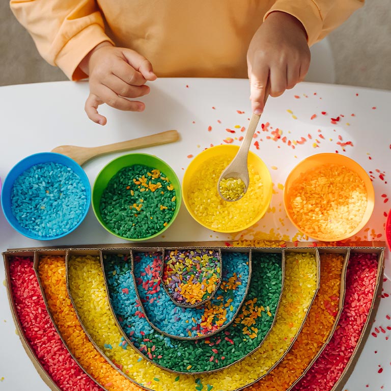 A child playing with a sensory activity 