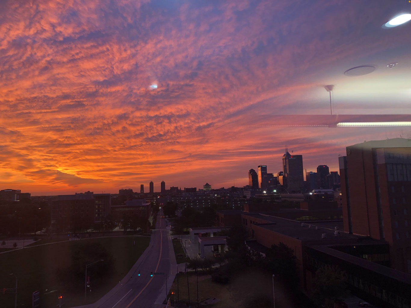 A picture taken of Downtown Indianapolis at sunset.