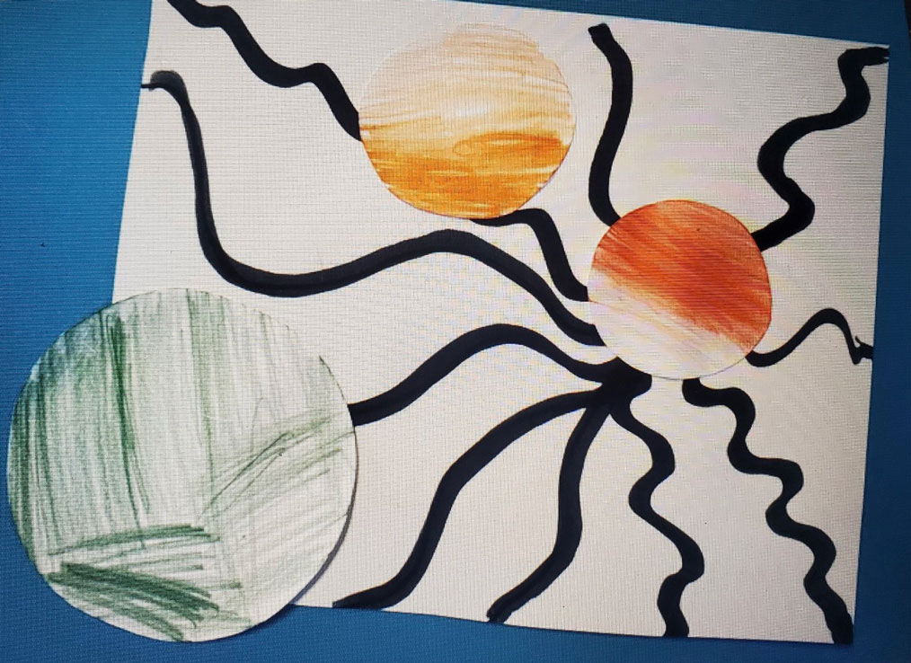 An abstract art piece of marbles on a black and white wavy background.