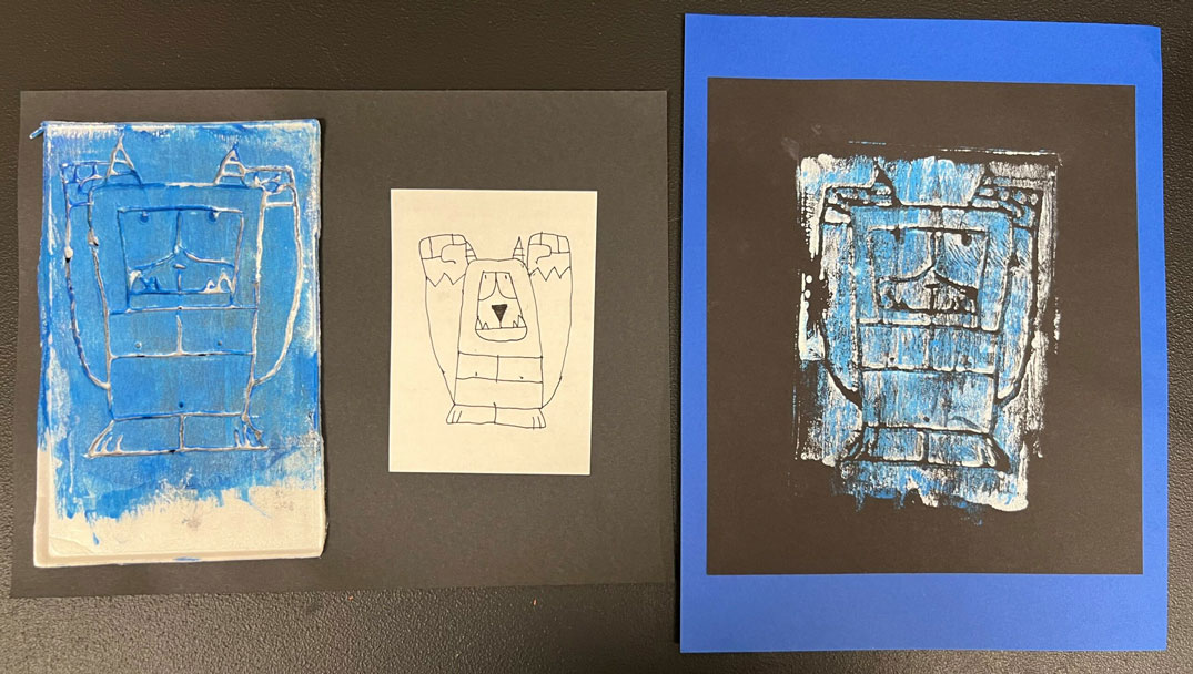 A linocut print of a monster in blue paint. 